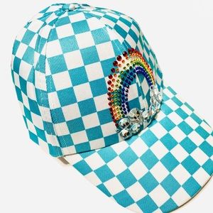 Sparkling Violet’s custom teal and white design and full brim casual hat.